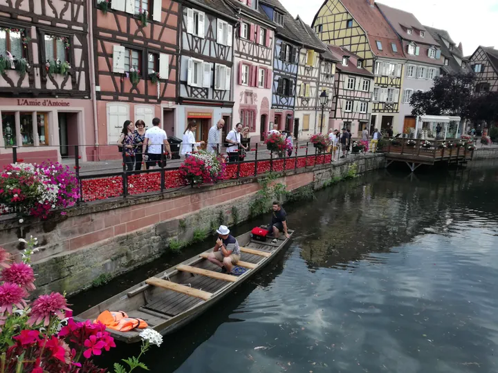 Folklore dancing in the evening at Colmar, Alsace (France)